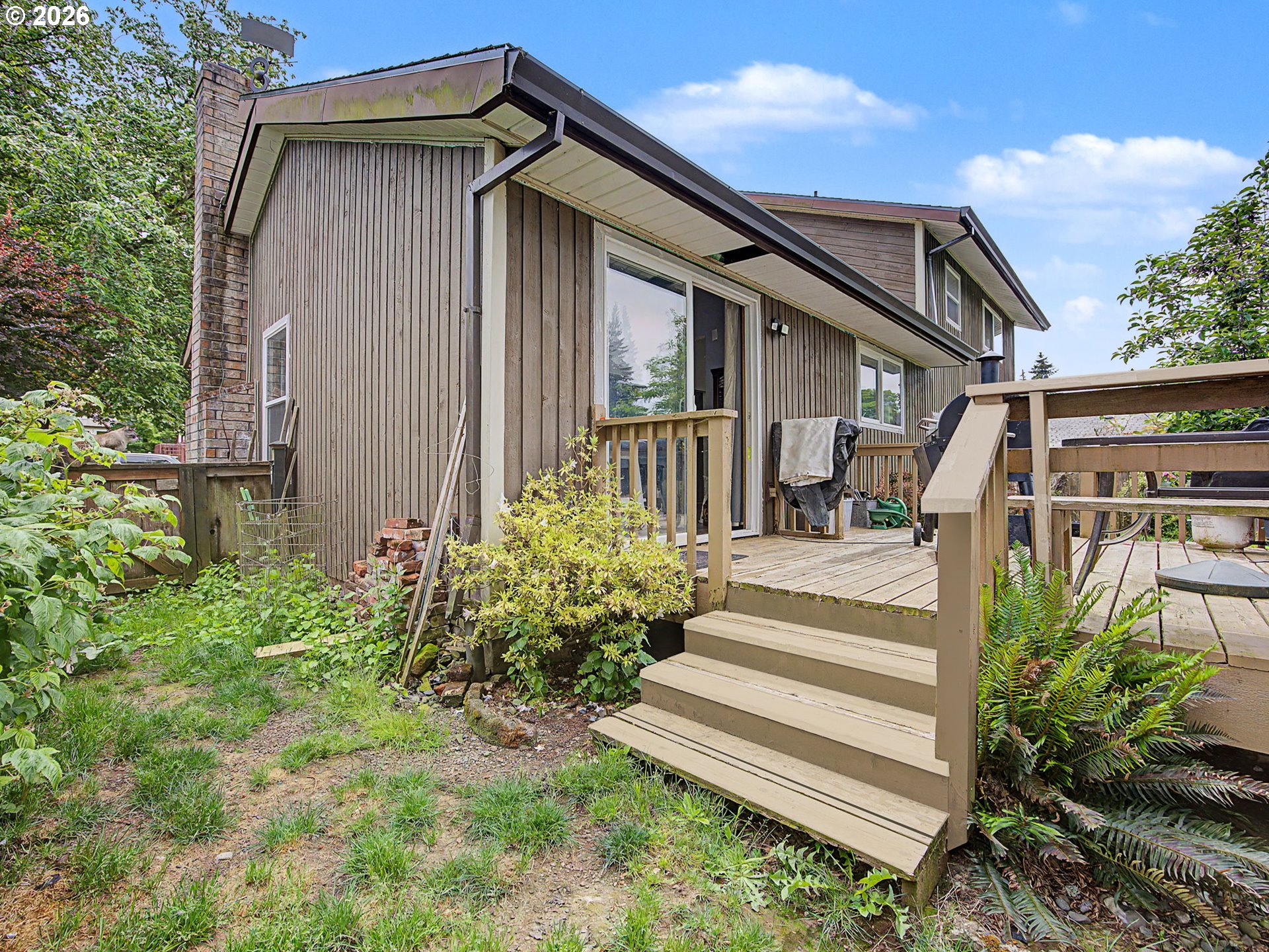 18015 Davis Street Sandy, OR 97055 - Photo 35 of 40 a front view of a house with a yard
