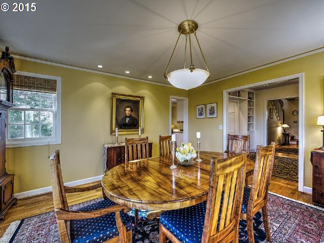 7524 Southwest View Point Terrace Portland, OR 97219 - Photo 4 of 16 a view of a dining room with furniture and a chandelier