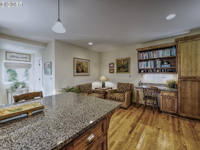7524 Southwest View Point Terrace Portland, OR 97219 - Photo 7 of 16 a living room with furniture hard wood floor and a rug