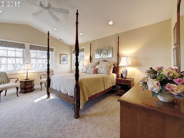 7524 Southwest View Point Terrace Portland, OR 97219 - Photo 9 of 16 a bedroom with bed couch and window