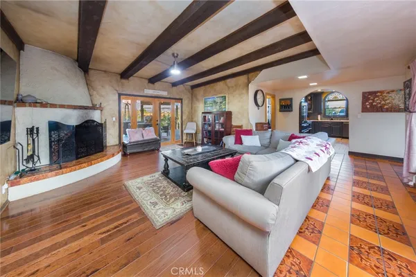 a kitchen with granite countertop a cabinets and steel stainless steel appliances
