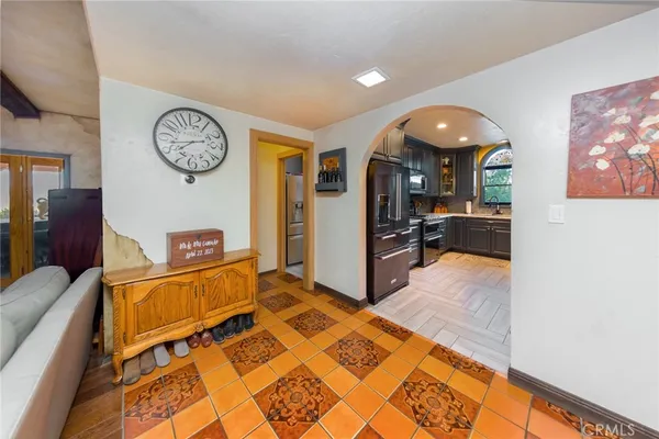 a kitchen with a sink a cabinets and window