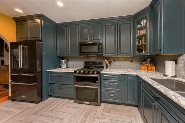a living room with furniture and a rug