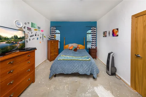 a view of a outdoor space with a patio and a yard