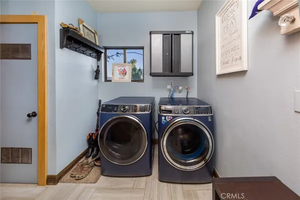 a view of a house with wooden wall