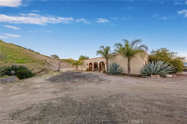a view of a balcony with an ocean view