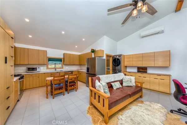 a view of a backyard with sitting area