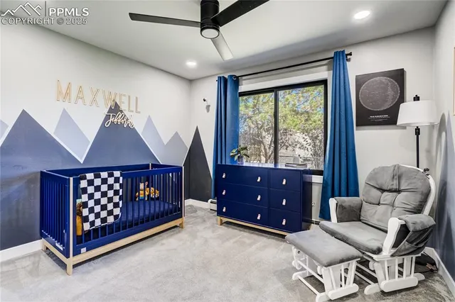 a bedroom with furniture and windows