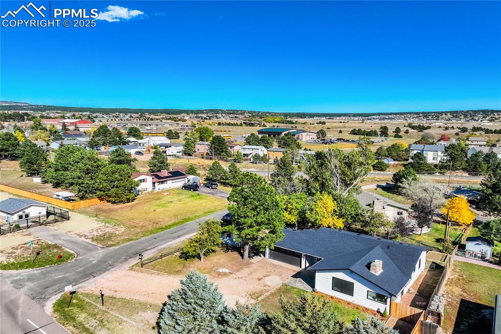 204 Mitchell Avenue Monument, CO 80132 - Photo 41 of 46 an aerial view of residential houses with outdoor space and seating