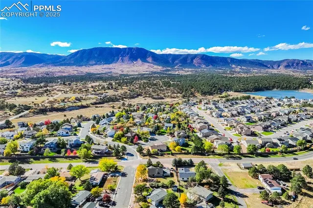 a view of a swimming pool with an ocean view