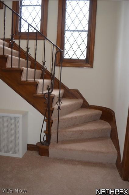 3705 Sutherland Road Shaker Heights, OH 44122 - Photo 9 of 21 Winding staircase to 2nd floor with three leaded glass windows.