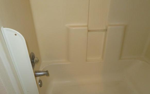 113 West Clark Street Madera, CA 93638 - Photo 7 of 11 a bathroom with a shower