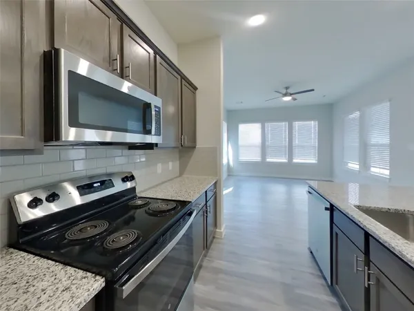 $2,379 | 9835 Willow Creek, Unit 422, Tomball, TX 77375