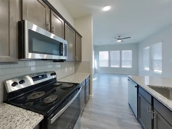 $2,379 | 9835 Willow Creek, Unit 422, Tomball, TX 77375