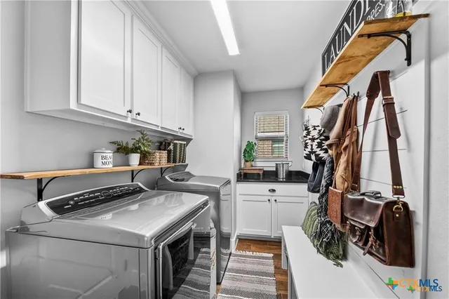 a view of a kitchen with appliances