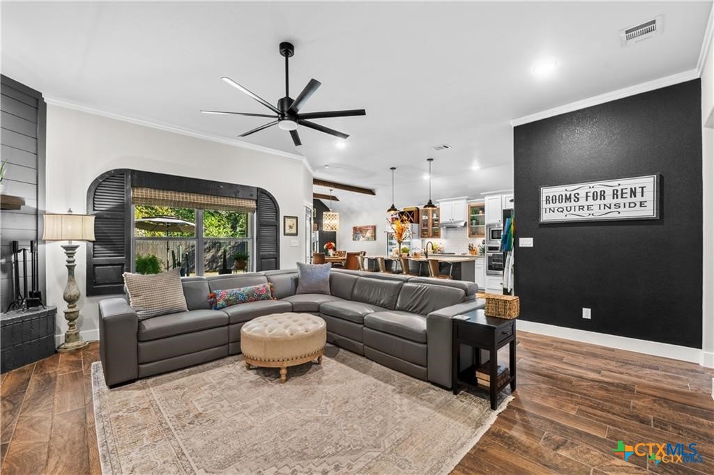 7306 Golden Heart Drive Temple, TX 76502 - Photo 3 of 25 a living room with furniture and a large window