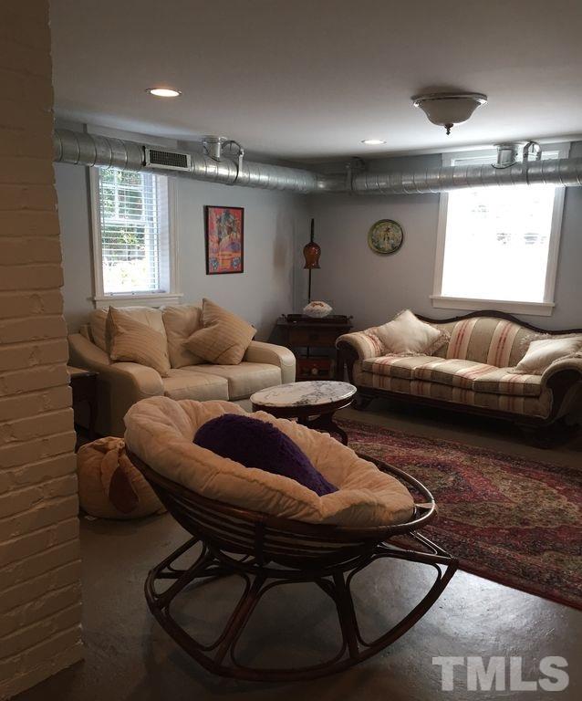 915 West Johnson Street Raleigh, NC 27605 - Photo 11 of 12 a living room with furniture and a window