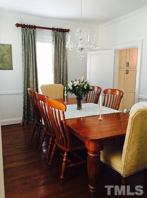 915 West Johnson Street Raleigh, NC 27605 - Photo 4 of 12 a view of a dining room with furniture window and wooden floor