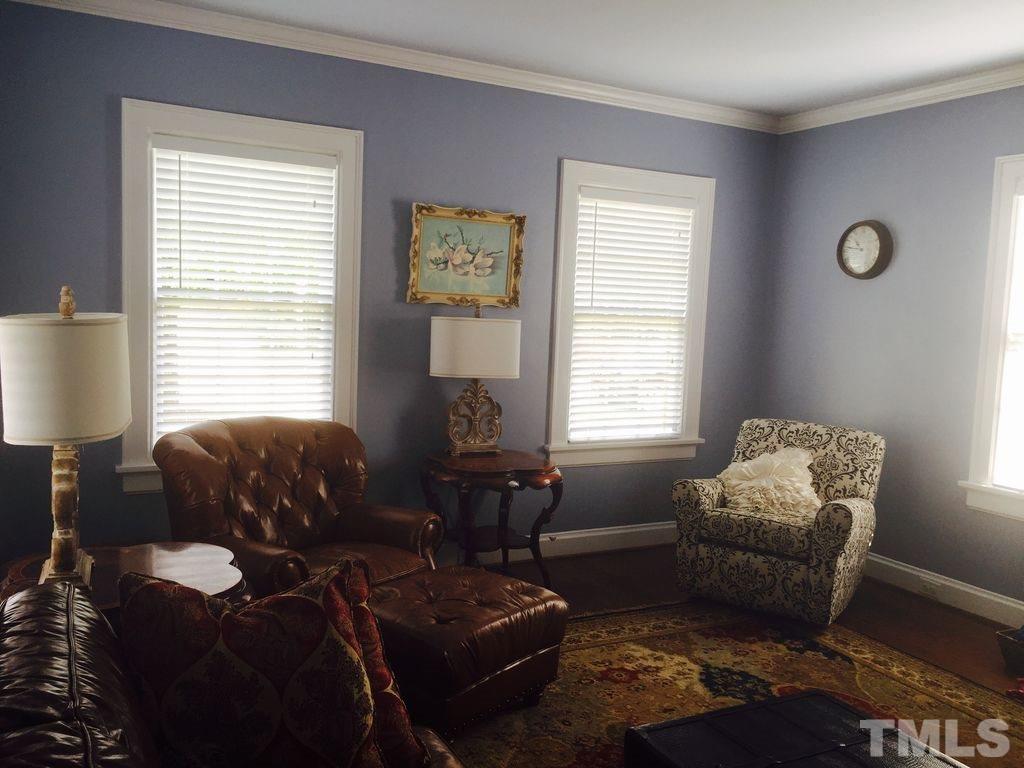 915 West Johnson Street Raleigh, NC 27605 - Photo 7 of 12 a living room with furniture and a window