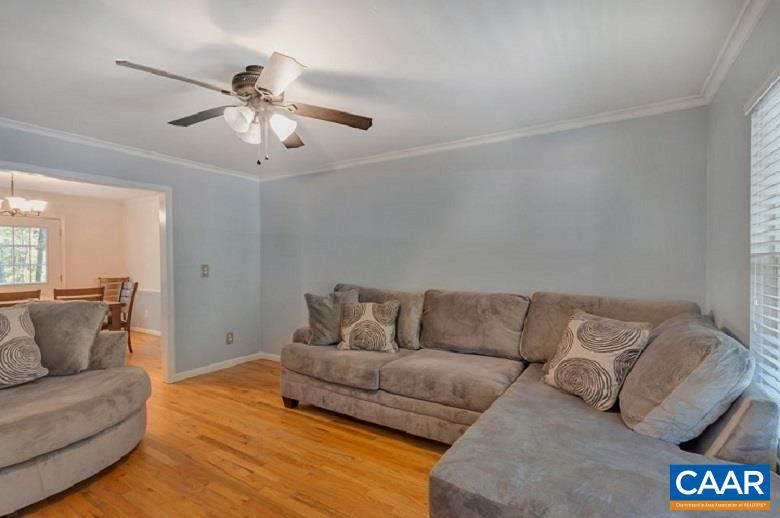 5 Cliftwood Road Palmyra, VA 22963 - Photo 13 of 49 a living room with furniture and a ceiling fan