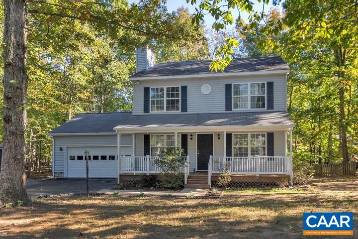 5 Cliftwood Road Palmyra, VA 22963 - Photo 2 of 49 a view of a white house with large windows and a large tree
