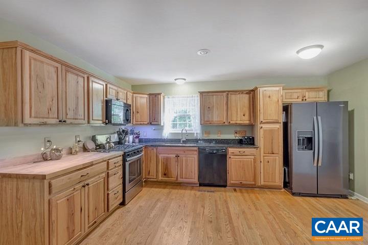 5 Cliftwood Road Palmyra, VA 22963 - Photo 8 of 49 a kitchen with a sink stove and refrigerator