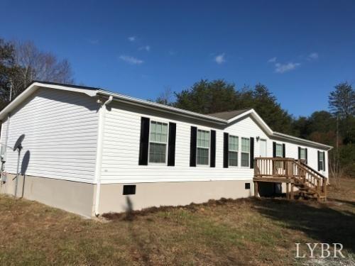 263 George Hairston Road Fieldale, VA 24089 - Photo 1 of 22 a front view of a house with a yard