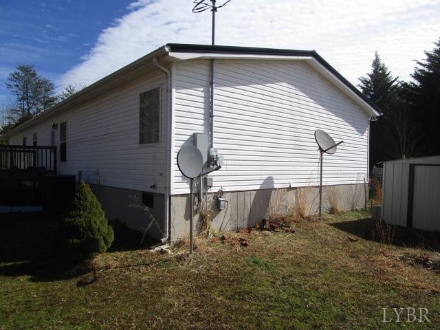 263 George Hairston Road Fieldale, VA 24089 - Photo 19 of 22 a front view of a house with a yard