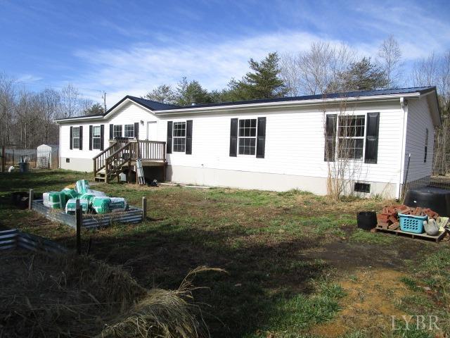 263 George Hairston Road Fieldale, VA 24089 - Photo 2 of 22 a front view of a house with garden