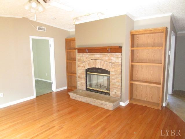 263 George Hairston Road Fieldale, VA 24089 - Photo 3 of 22 a view of empty room with a fireplace