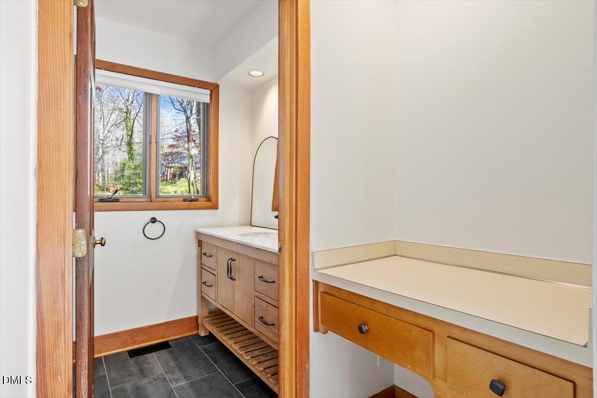 4805 Rembert Drive Raleigh, NC 27612 - Photo 25 of 45 a view of bathroom with a window