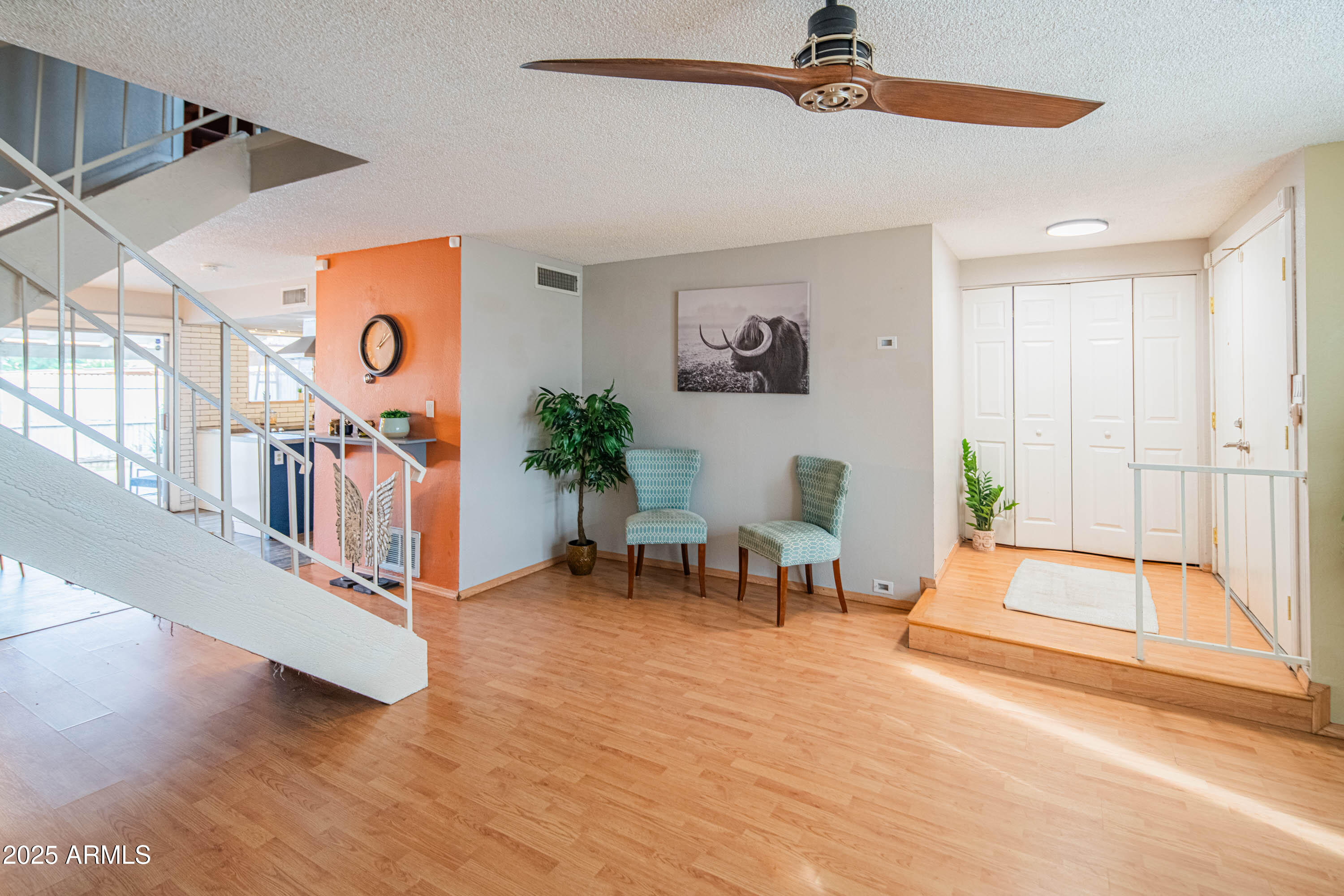 3203 West Royal Palm Road Phoenix, AZ 85051 - Photo 12 of 29 a view of an entryway with wooden floor