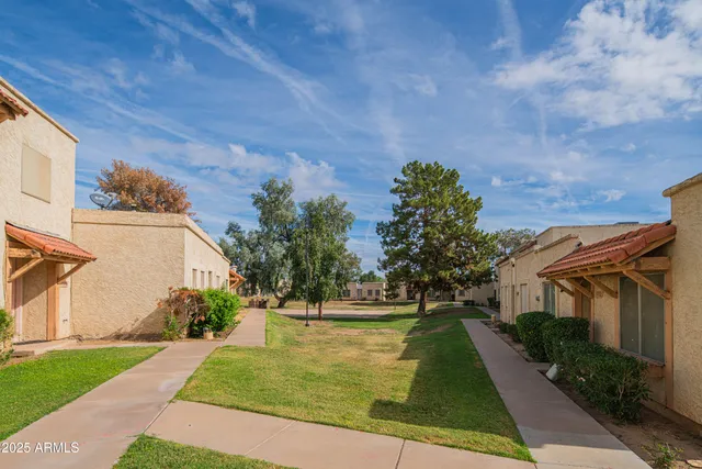 a view of a balcony with a floor to ceiling window