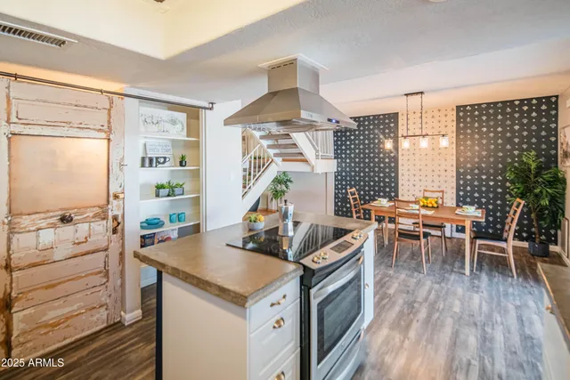 a view of a living room and dining room