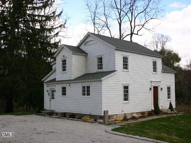 327 Old Branchville Road Ridgefield, CT 06877 - Photo 1 of 1 a view of a house with a yard