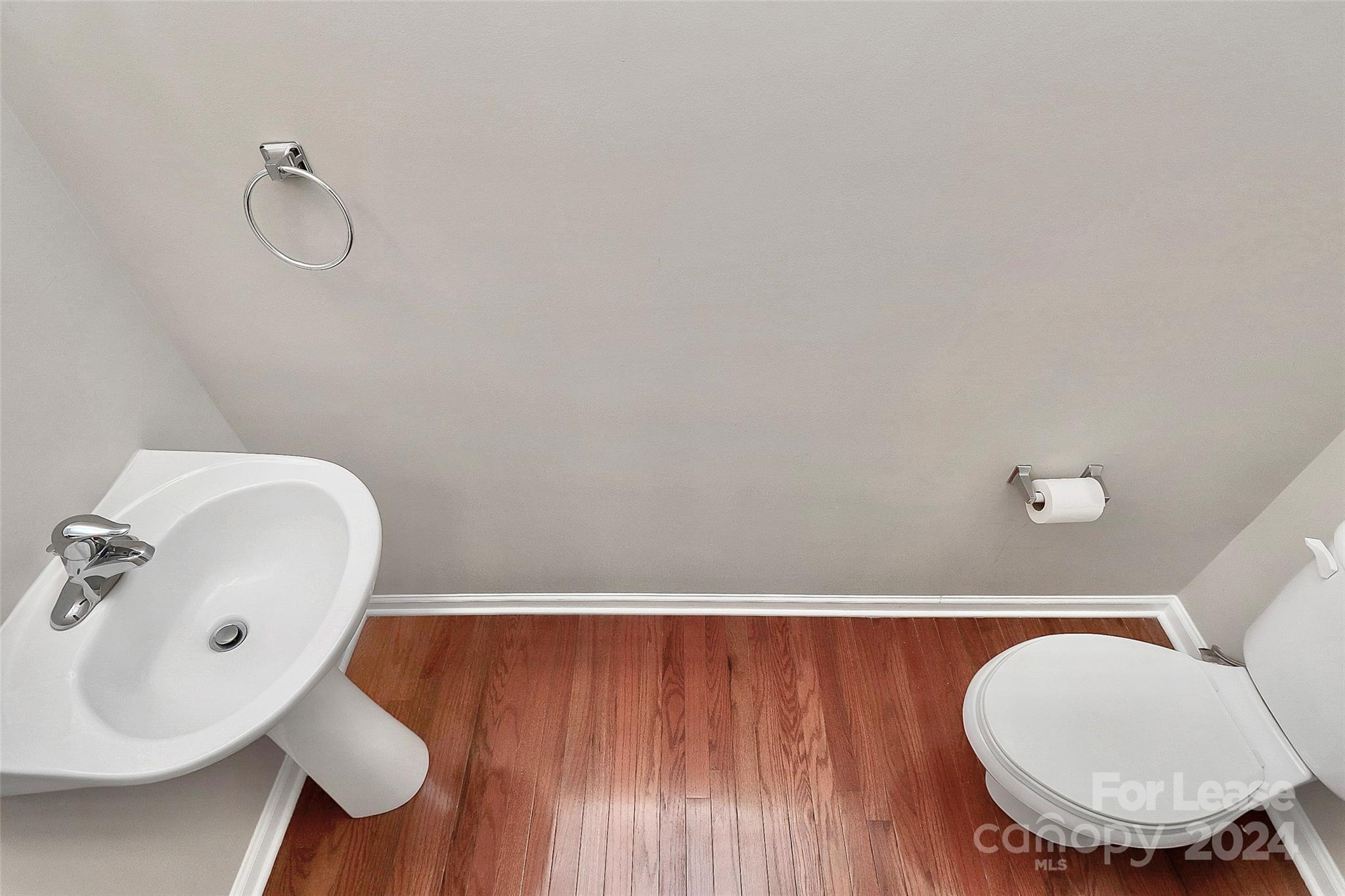 20543 Harbor View Drive Cornelius, NC 28031 - Photo 12 of 35 a bathroom with a toilet sink and mirror