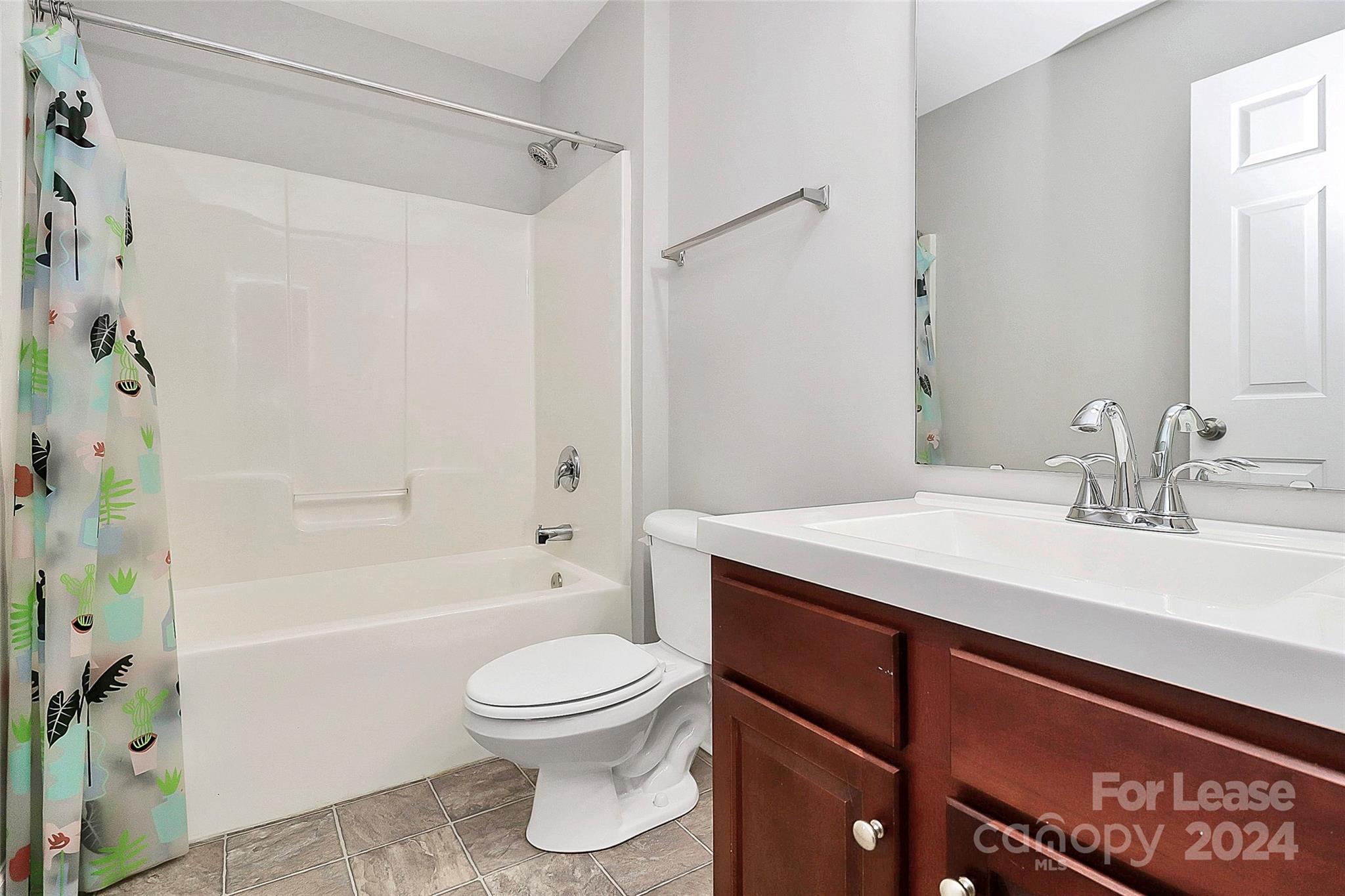 20543 Harbor View Drive Cornelius, NC 28031 - Photo 16 of 35 a bathroom with a sink a toilet and shower