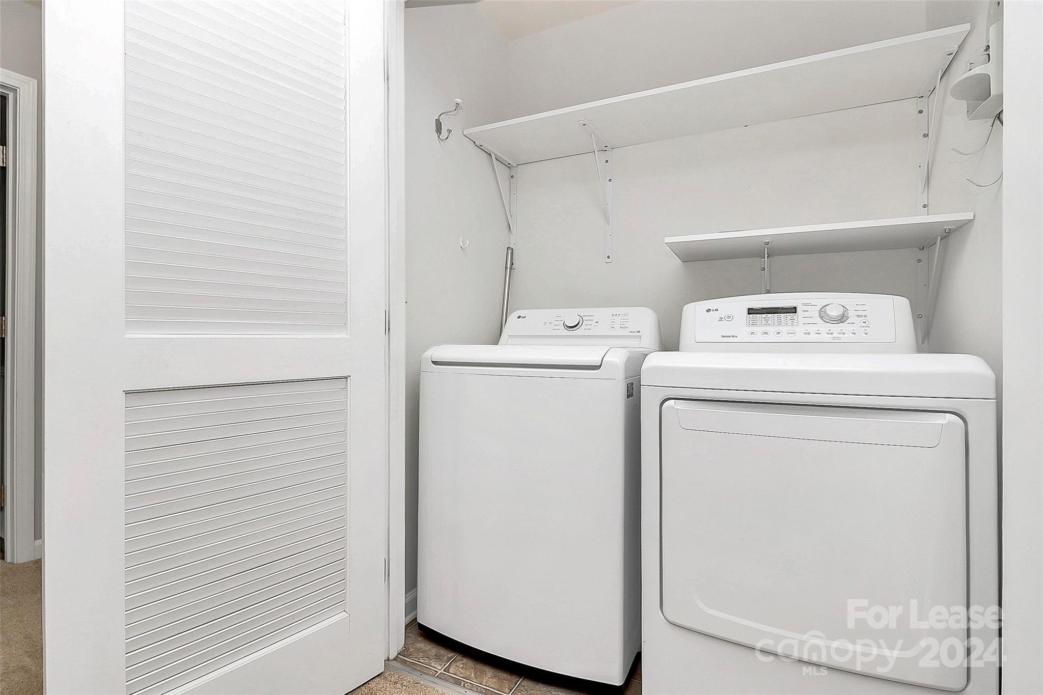 20543 Harbor View Drive Cornelius, NC 28031 - Photo 23 of 35 a utility room with dryer and washer
