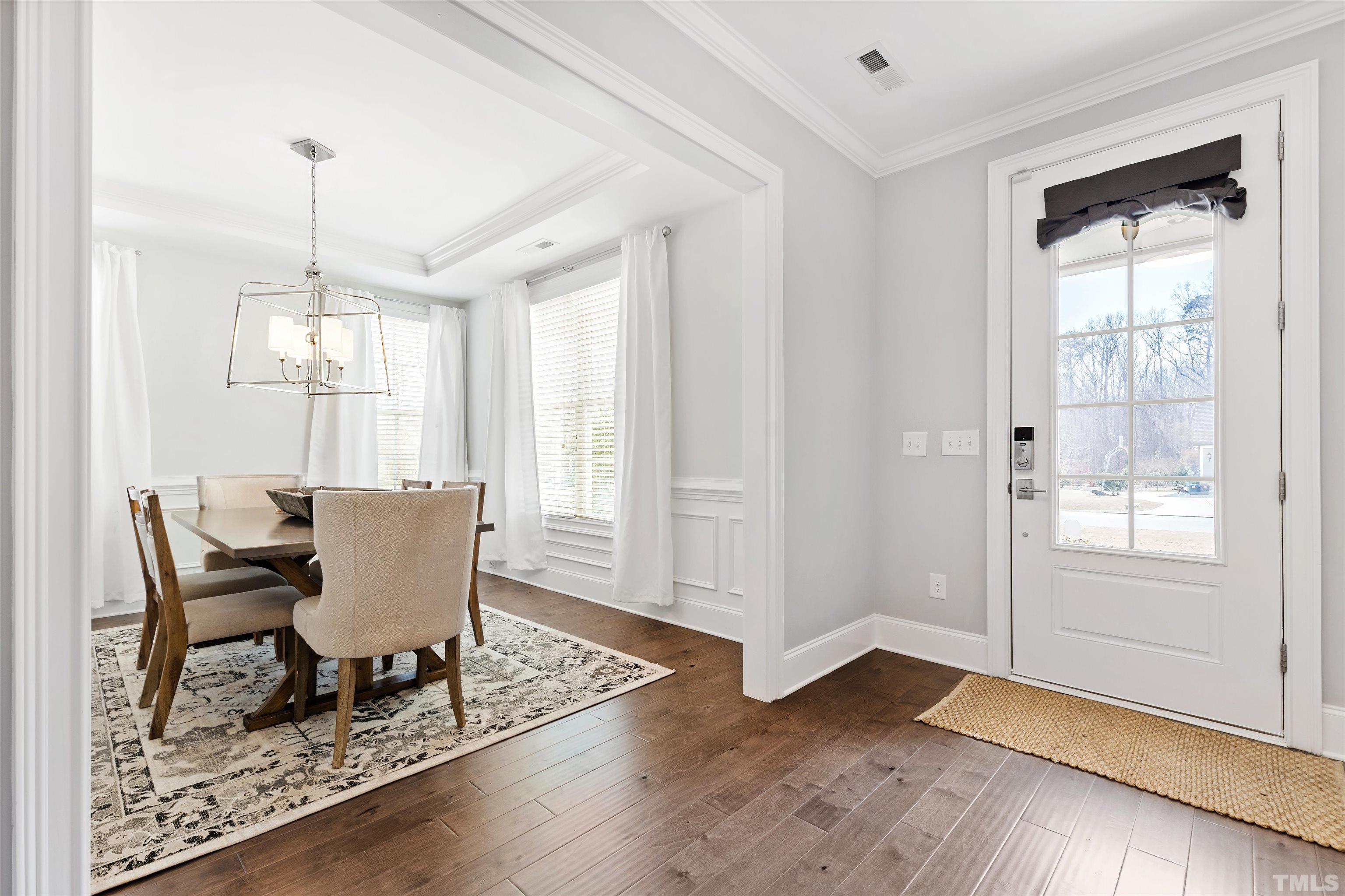 4121 Olde Judd Drive Willow Spring, NC 27592 - Photo 4 of 61 a view of a dining room with furniture window and wooden floor