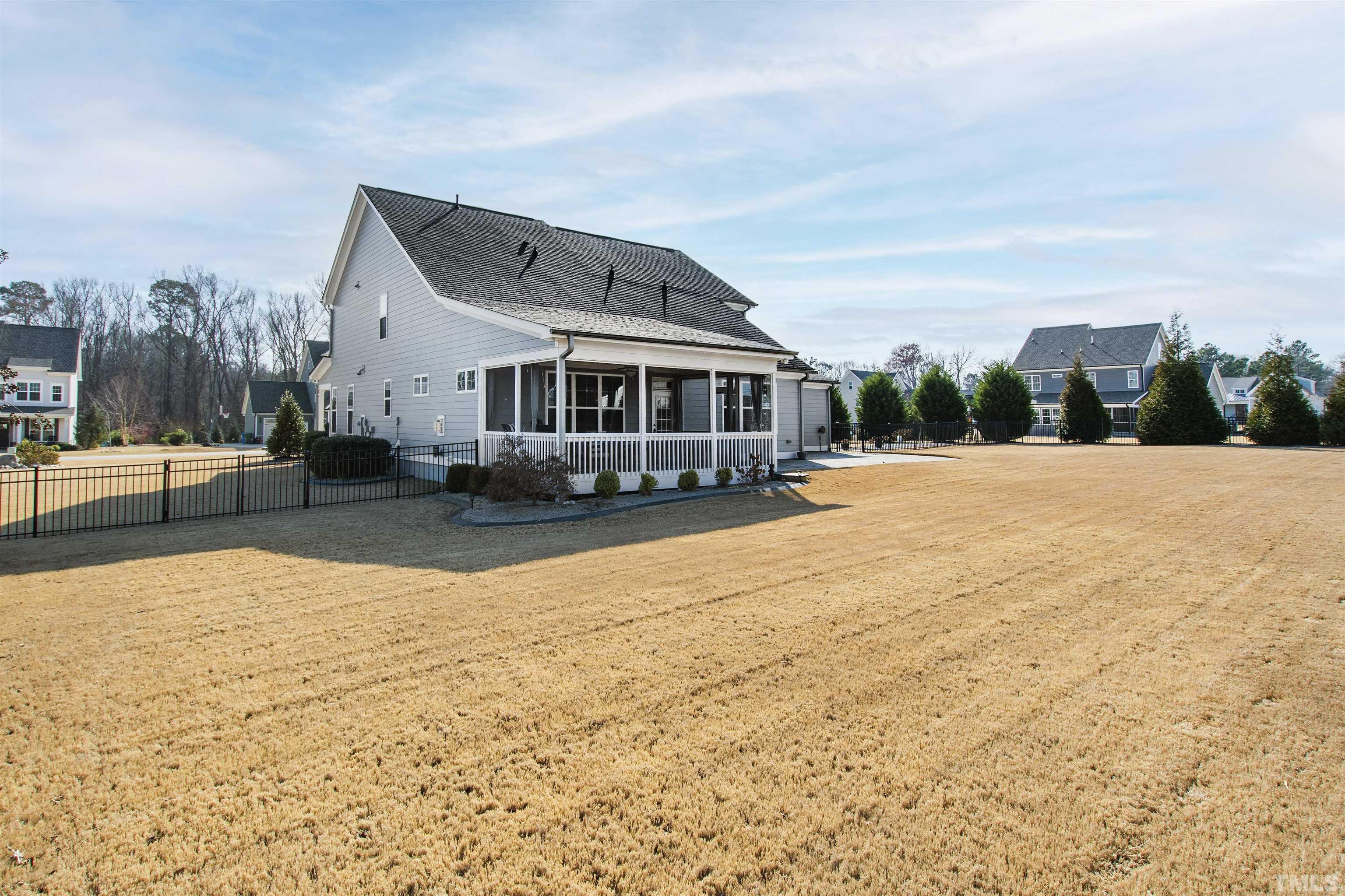 4121 Olde Judd Drive Willow Spring, NC 27592 - Photo 61 of 61 a front view of a house with a yard