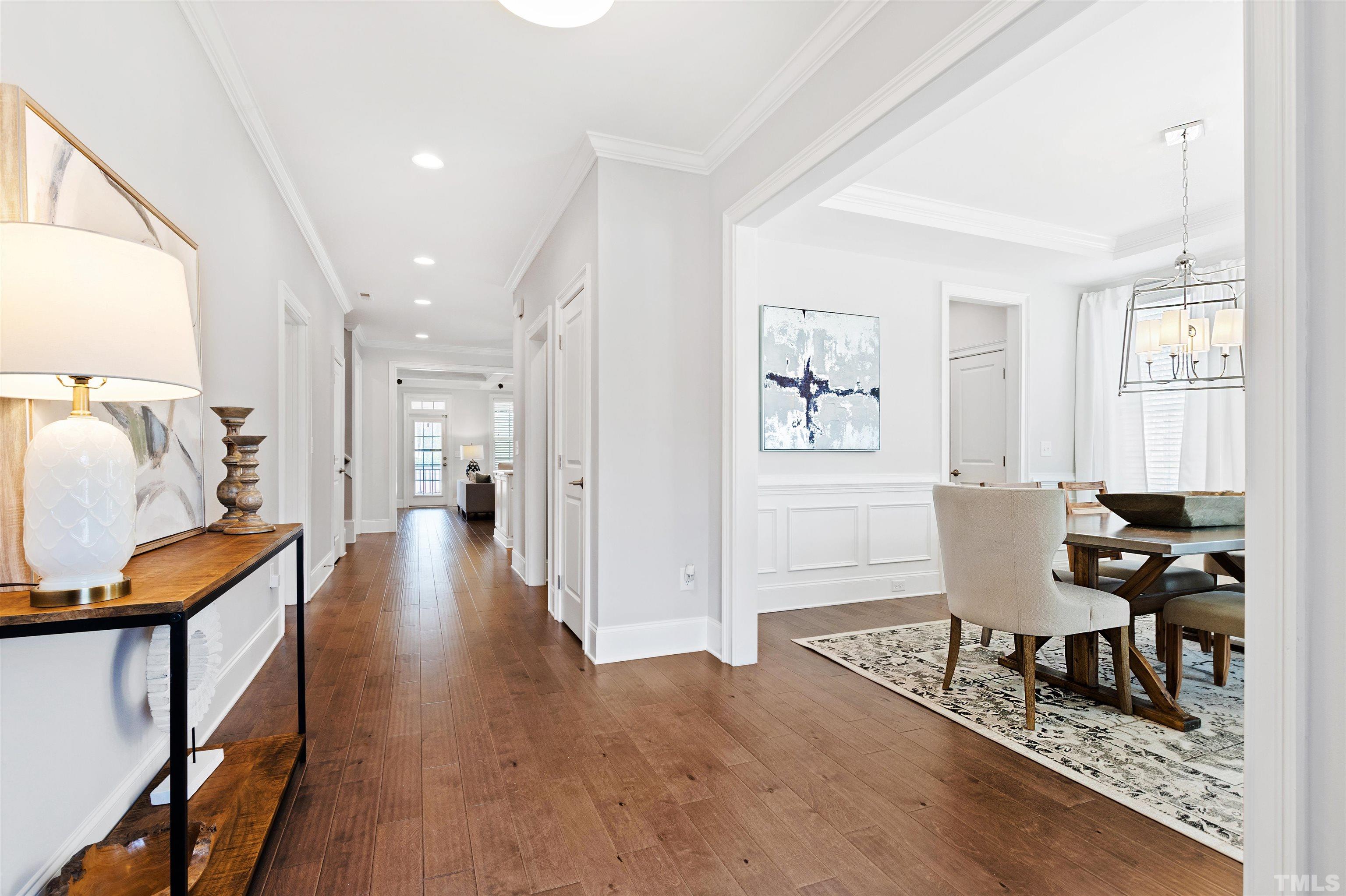 4121 Olde Judd Drive Willow Spring, NC 27592 - Photo 8 of 61 a living room with furniture and a wooden floor