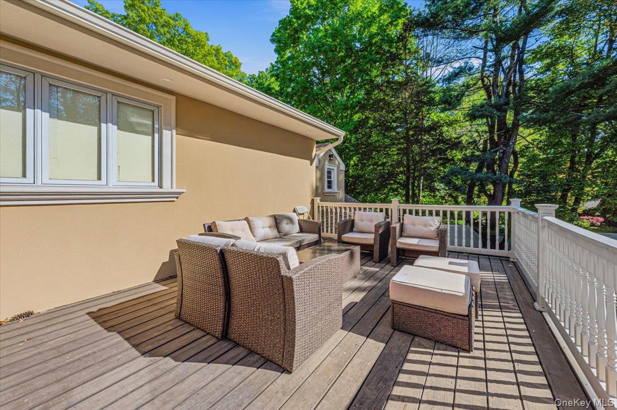 626 Caledonia Road Dix Hills, NY 11746 - Photo 33 of 49 a terrace of a house with outdoor seating