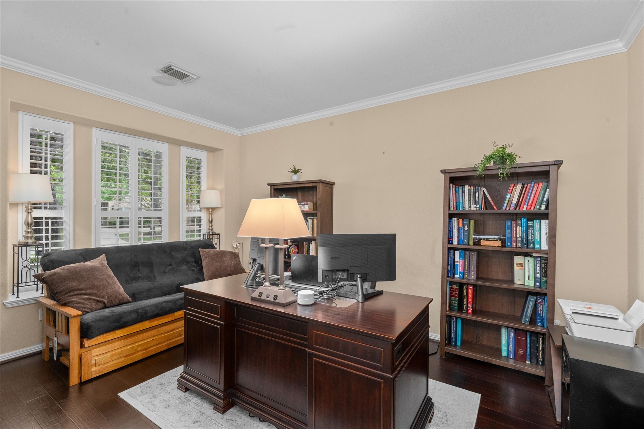 9822 Prairie Clover Lane Spring, TX 77379 - Photo 11 of 46 a living room with furniture and a book shelf