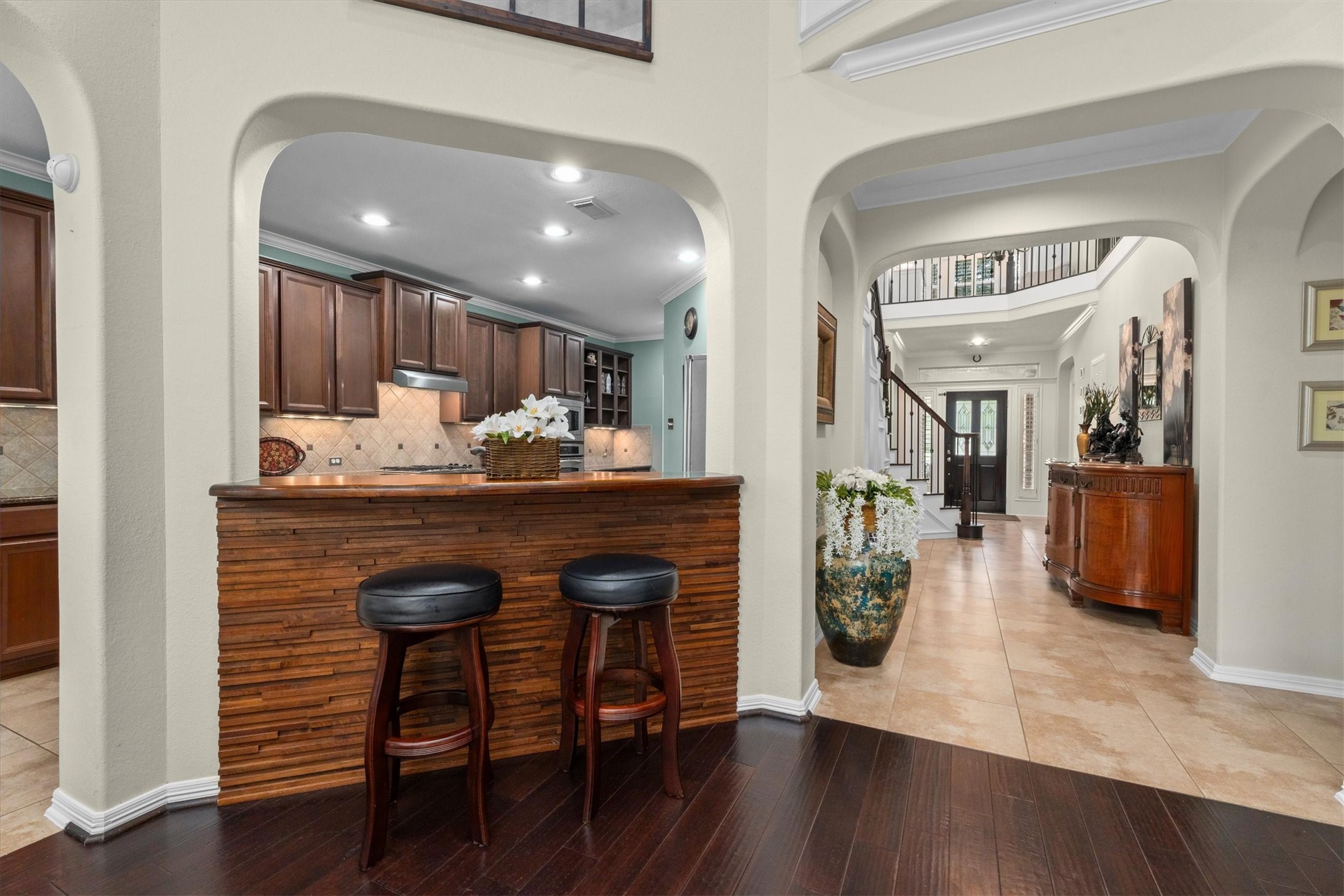 9822 Prairie Clover Lane Spring, TX 77379 - Photo 14 of 46 a kitchen with a table and chairs