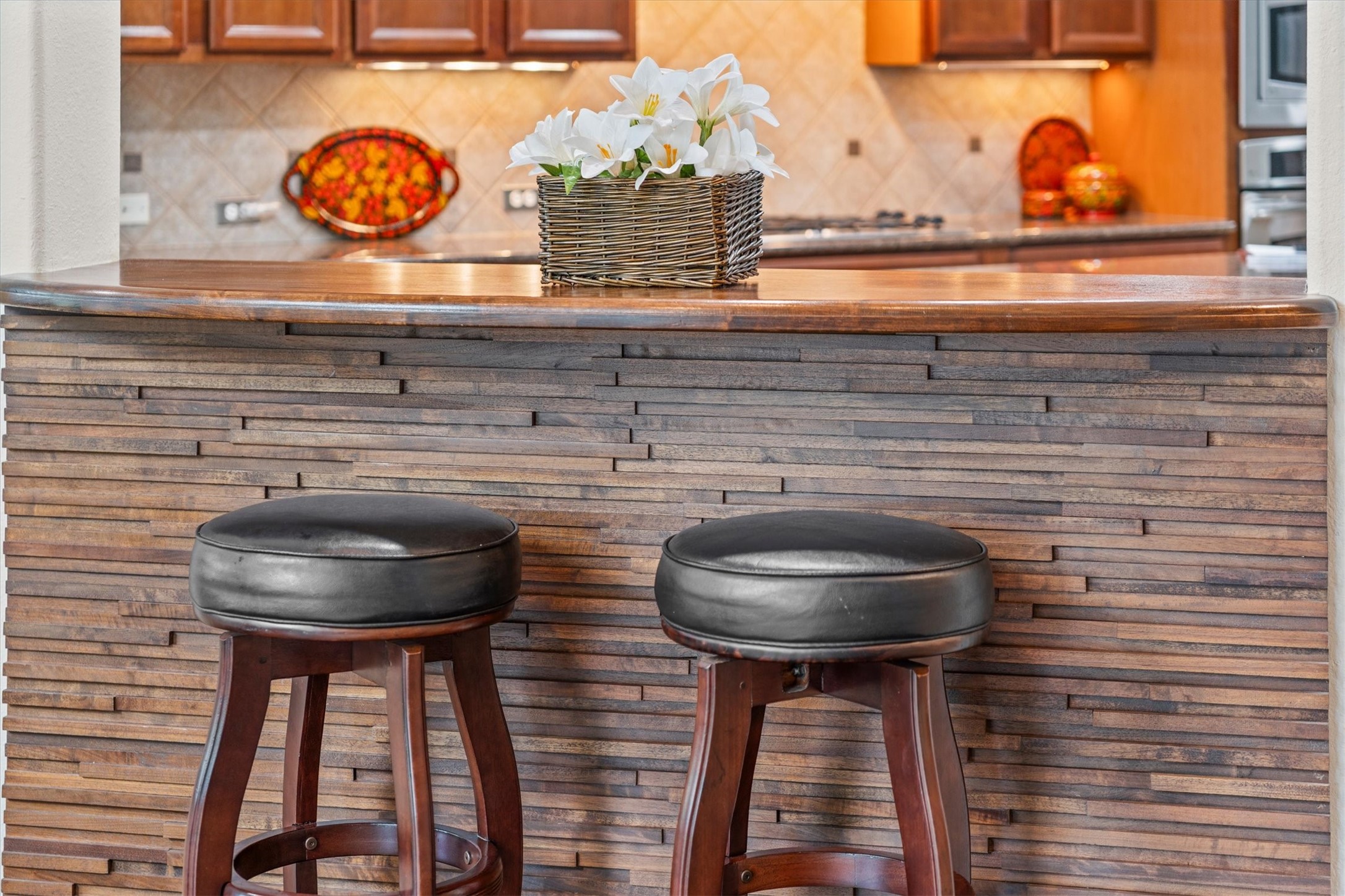 9822 Prairie Clover Lane Spring, TX 77379 - Photo 15 of 46 a kitchen with a table and a stove
