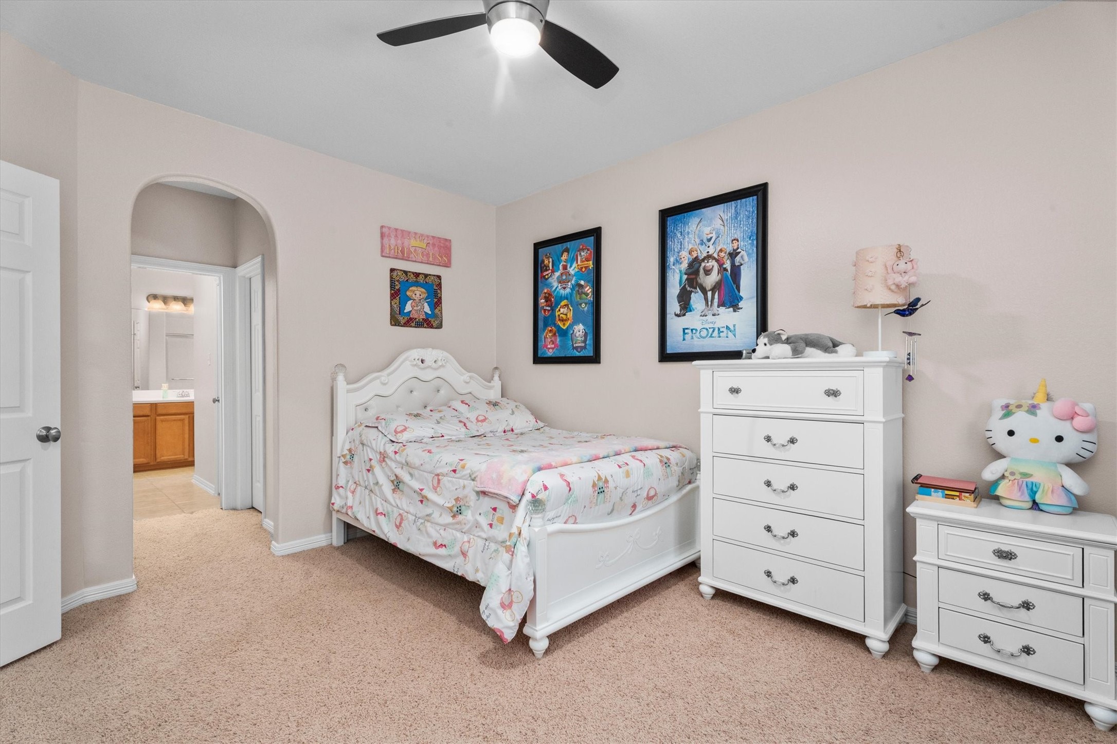 9822 Prairie Clover Lane Spring, TX 77379 - Photo 35 of 46 a bedroom with a baby bed and dresser