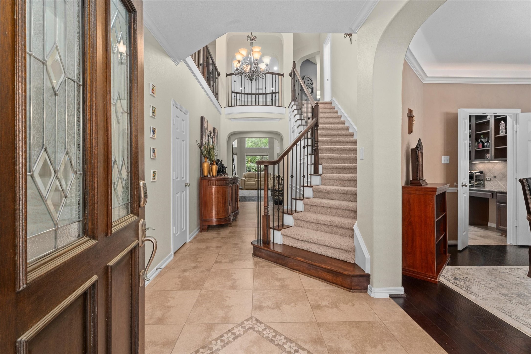 9822 Prairie Clover Lane Spring, TX 77379 - Photo 8 of 46 a view of a hallway with entryway wooden floor and livingroom view