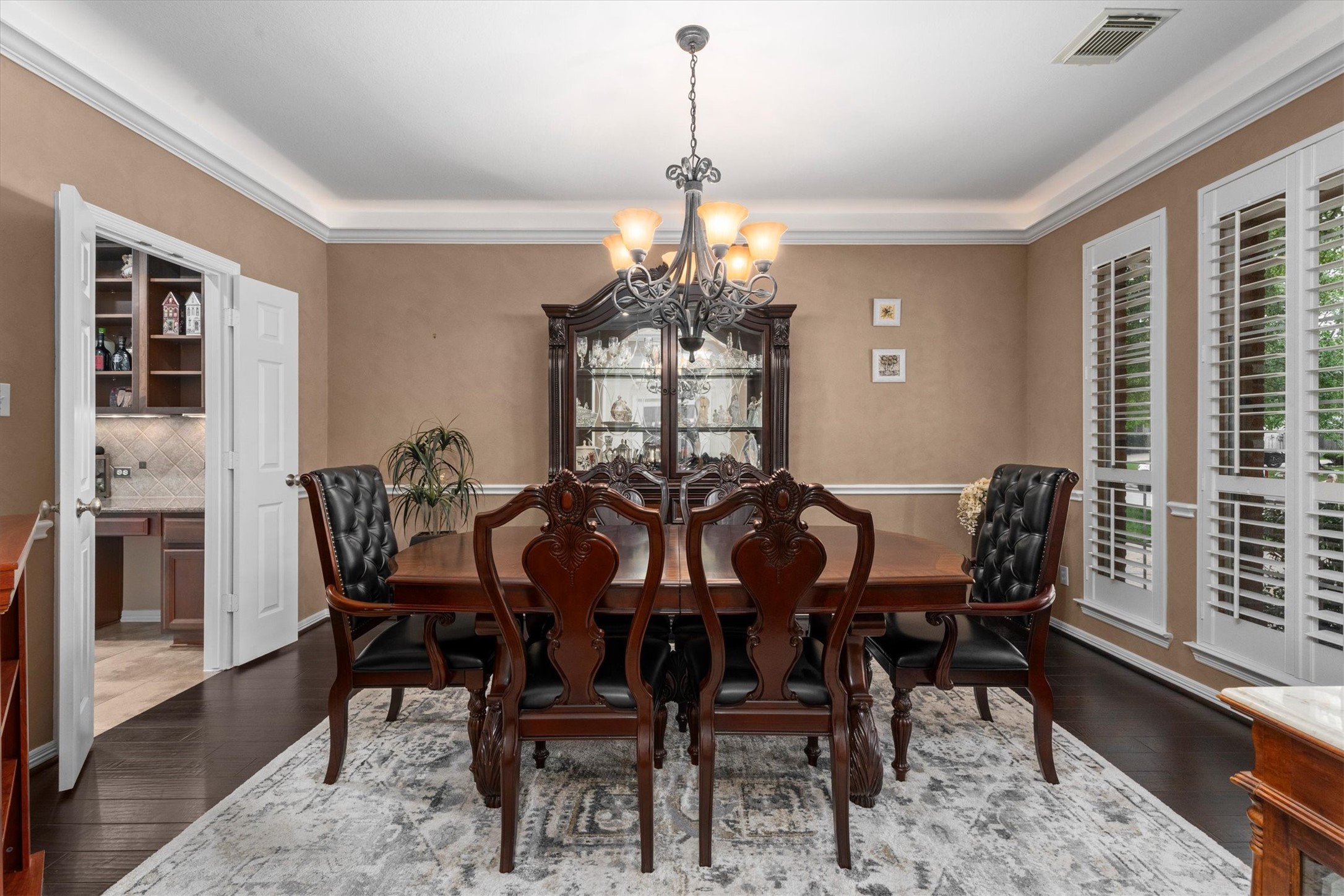 9822 Prairie Clover Lane Spring, TX 77379 - Photo 9 of 46 a view of a dining room with furniture window and wooden floor