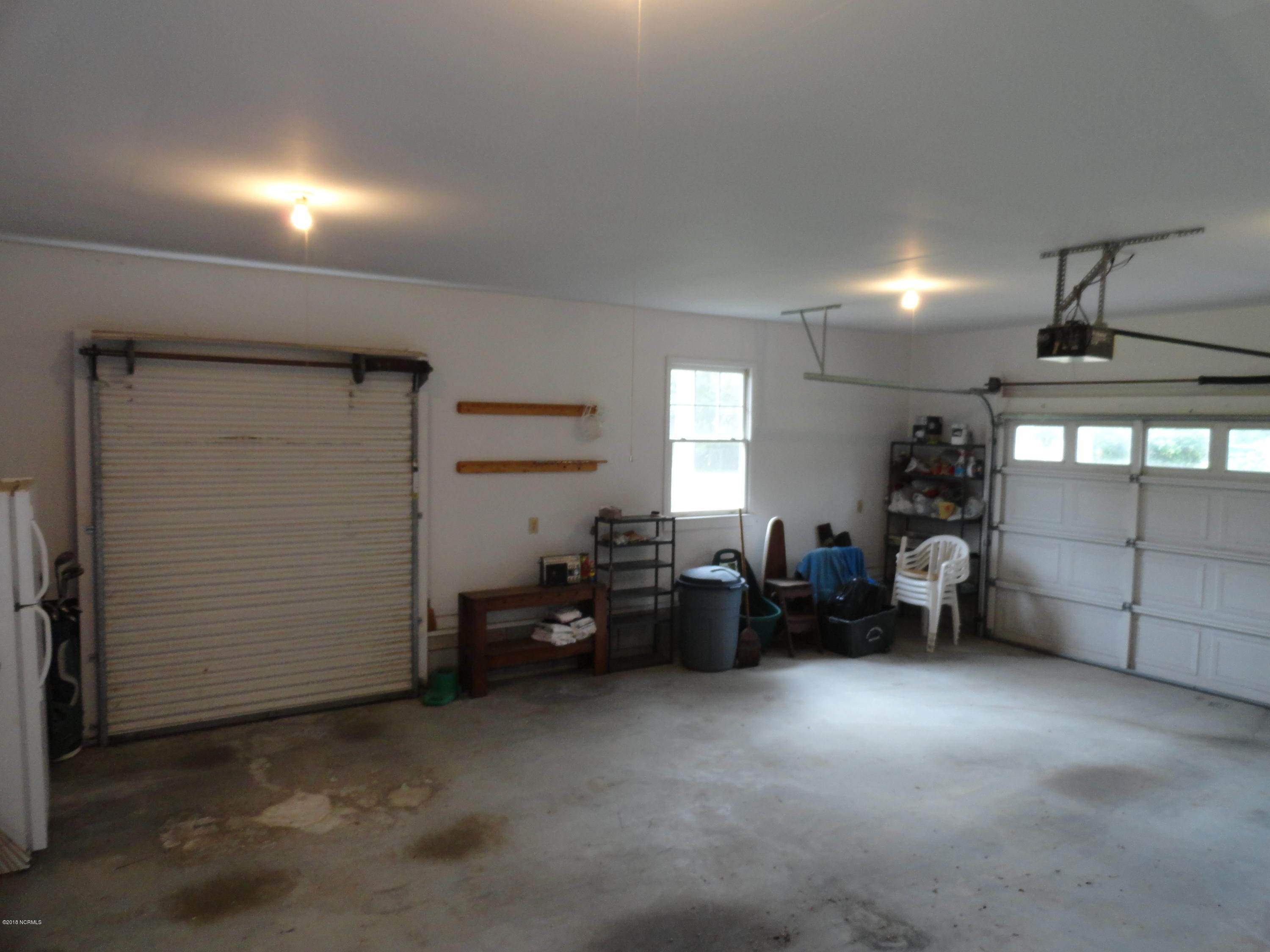 222 Snead Road New Bern, NC 28560 - Photo 29 of 35 Oversized Garage w/Roll up Door
