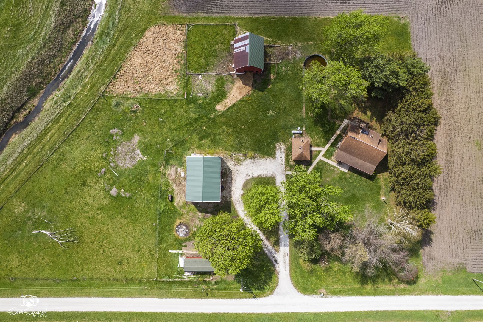 1235 North 1450 East Road Onarga, IL 60955 - Photo 11 of 34 an aerial view of a house with a yard basket ball court and outdoor seating